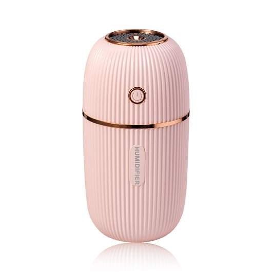 Navy blue portable humidifier with a ribbed texture, silver accents, and a power button on a white background. - Image 14