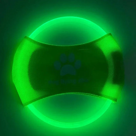 Red LED light-up dog flying disc with a white paw print logo and "dog flying disc" text. - Image 6