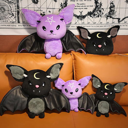 Black bat plush toy with grey ears and belly, pink nose, white fangs, and a yellow crescent moon. - Image 3