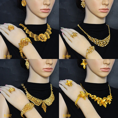 Women's four-piece gold-tone jewelry set with floral designs, including a necklace, bracelet, ring, and earrings. - Image 3