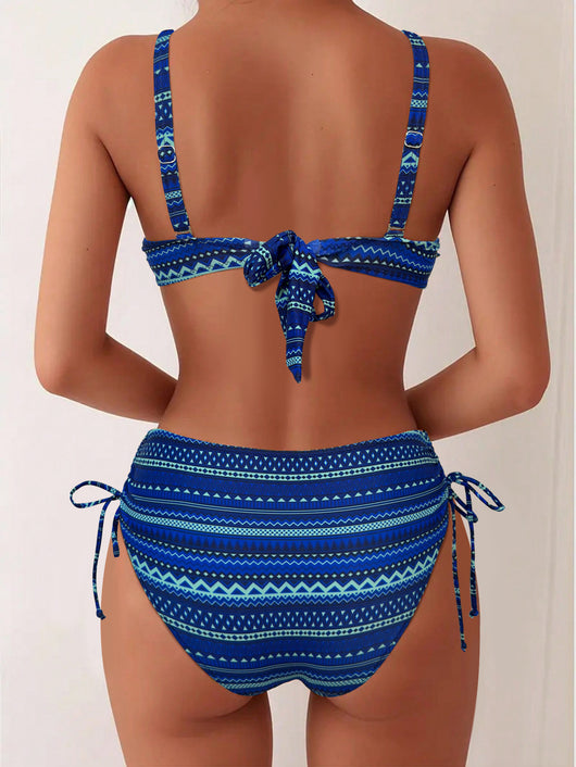 Blue, white, and black geometric print bikini with spaghetti strap bandeau top and high-waisted side-tie bottoms. - Image 16
