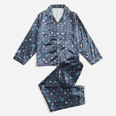 Three dark blue family pajama sets with white and light blue snowflake patterns, featuring long-sleeve tops and pants. - Image 21