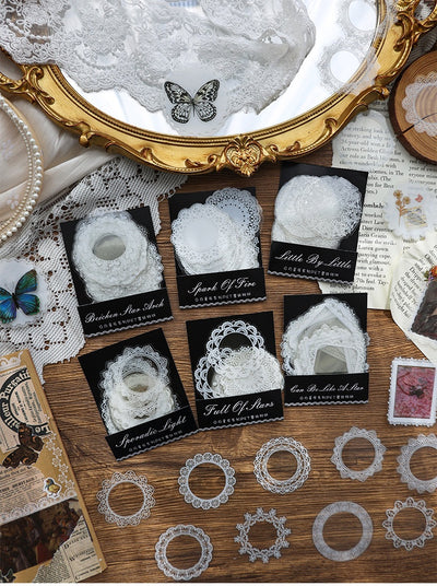 Set of 15 white lace-patterned circular stickers with intricate designs, labeled "North Star Arch" and "30 sheets." - Image 19