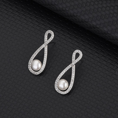 Aretes Infinito Ocho - Diseño Minimalista y Elegante - Image 8