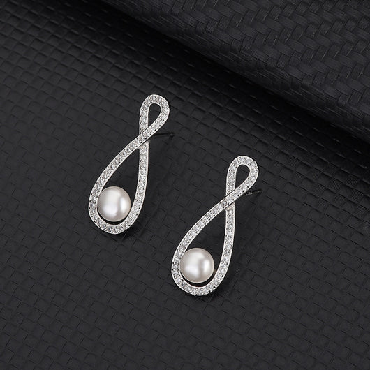 Aretes Infinito Ocho - Diseño Minimalista y Elegante - Image 8