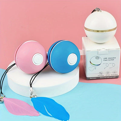 White electric interactive cat toy ball with LED light and feather attachment, shown with its white packaging box. - Image 9