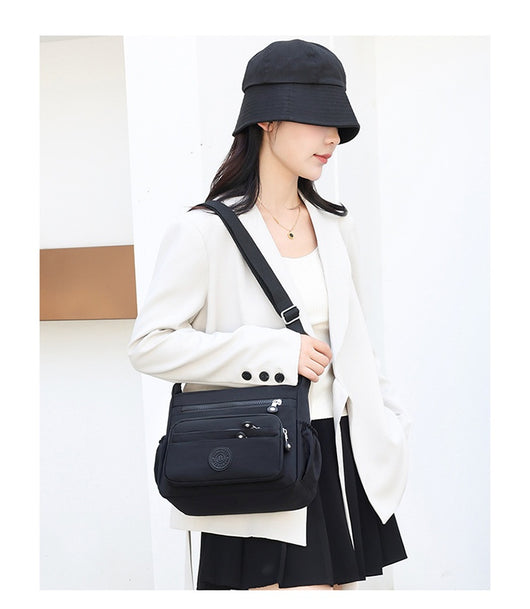 Bolsa Crossbody de Nylon Ligera con Gran Capacidad - Image 26