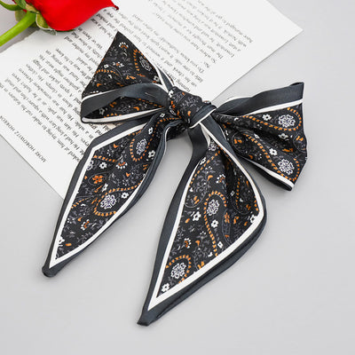 Clip Primavera para Coleta con Moño de Tela Estampada - Accesorio para Cabello Elegante - Image 2