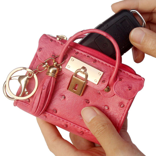 Bolso de Mano Minimalista en Cuero con Borlas - Image 8