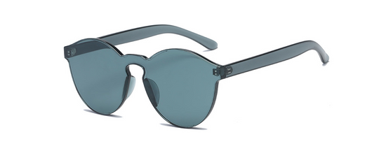Frameless round brown transparent sunglasses with an integrated design, featuring jelly-like lenses and matching temples. - Image 4