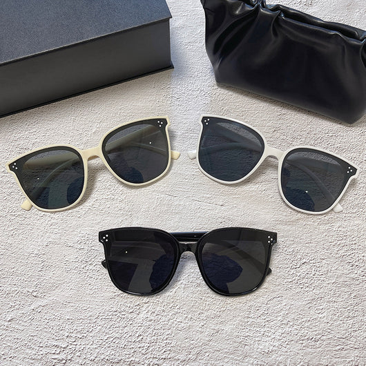 Cream square-style sunglasses with dark lenses, featuring small silver accents on the frame corners. - Image 18