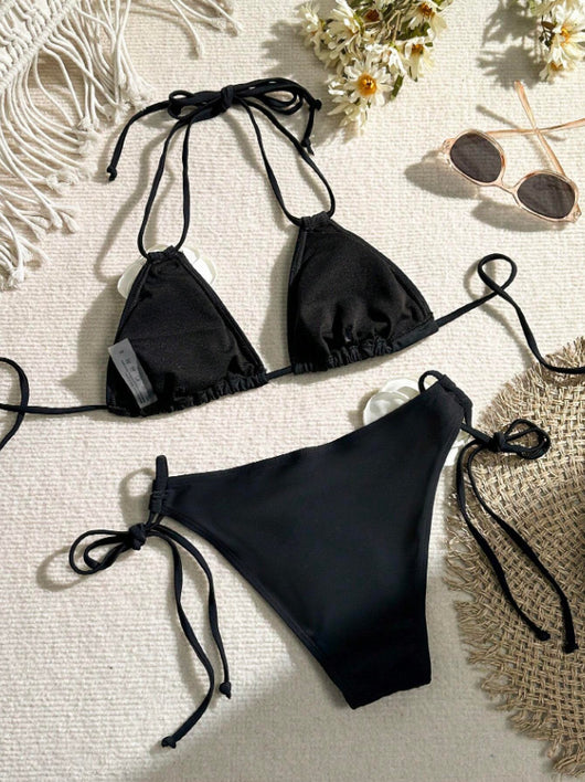 Black two-piece bikini with white 3D flower embellishments on the triangle top and tie-side bottom. - Image 10
