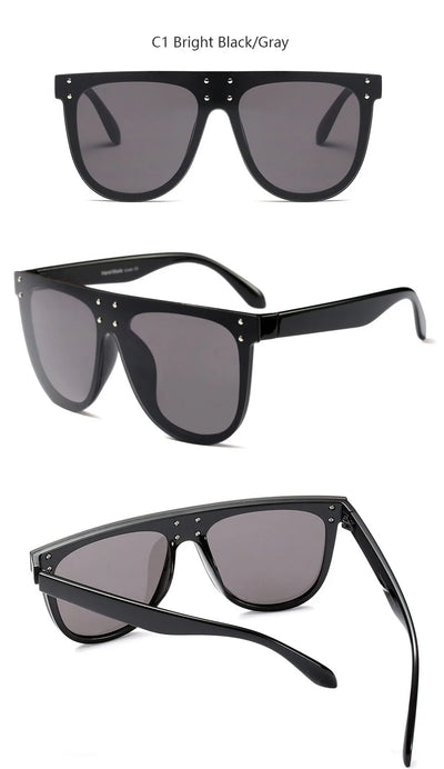 Black and white flat top sunglasses with dark lenses and small gold-toned stud details on the frame. - Image 17