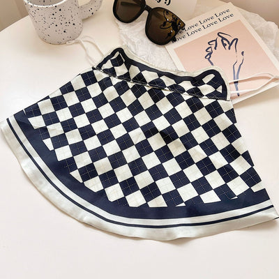 Female cream and black floral polka dot sun protection mask with ear loops, designed for eye corner protection. - Image 32