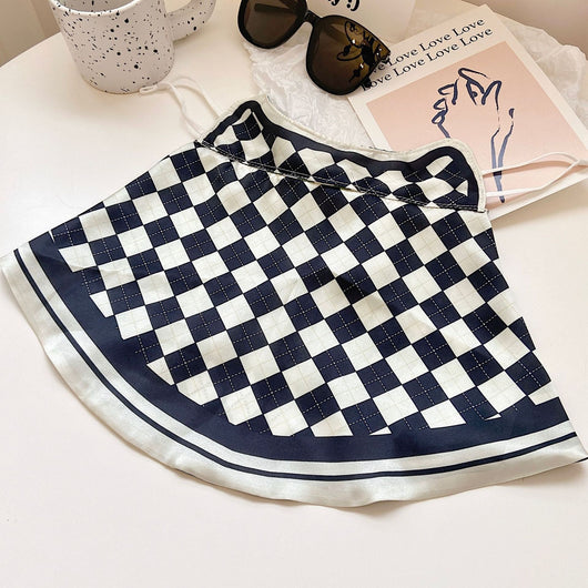 Female cream and black floral polka dot sun protection mask with ear loops, designed for eye corner protection. - Image 32