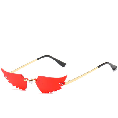 Purple wing-shaped rimless sunglasses with gold-colored metal arms and black ear tips on a white background. - Image 9