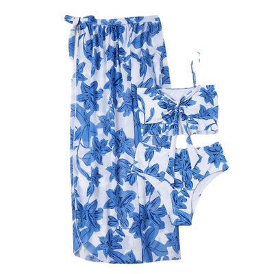 Women's pink floral print two-piece swimsuit with a tie-front crop top, high-waisted triangle bottoms, and matching sheer sarong. - Image 19