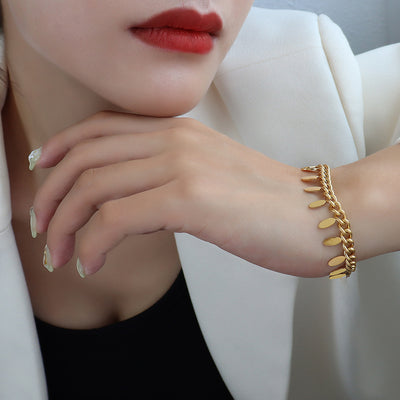 Pulsera de Cadena Elegante con Hoja y Borla - Image 10