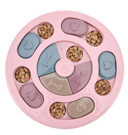 Paw-shaped dog puzzle feeder toy in light yellow with colorful sliding covers, filled with kibble. - Image 19