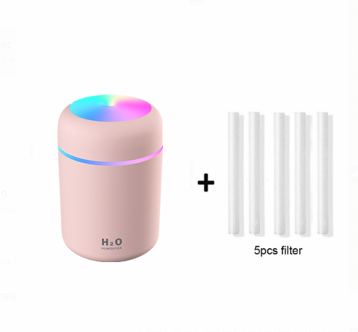 Dark gray cylindrical humidifier with colorful LED top light and thin light band, shown with five white filter sticks. - Image 5