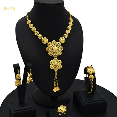 Ornate gold-colored bridal jewelry set with filigree design, including a necklace, drop earrings, bracelet, and ring. - Image 5
