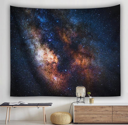 Rectangular tapestry with a vibrant Milky Way galaxy print, featuring bright nebulae and countless stars, hung on a wall.