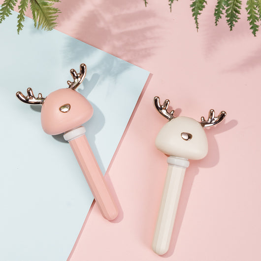 White and clear columnar mini humidifier with a cute bird-shaped top, featuring rose gold beak and tail accents. - Image 9