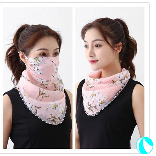 White women's UV protection scarf with black speckle pattern, worn as a face mask and neck scarf. - Image 21