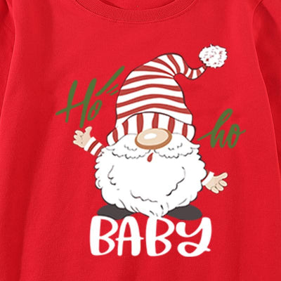 Family matching white long-sleeve crew neck tops with a cute snowman face print, featuring black eyes, an orange carrot nose, and a dotted smile. One adult top - Image 7