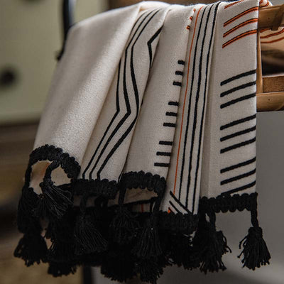 Boho cream cotton and linen curtain with tribal print in black and orange, featuring black fringe tassels. - Image 15