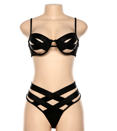 Woman wearing a white two-piece bikini with a bralette top featuring sheer cut-outs and a high-cut thong bottom with multiple straps. - Image 9