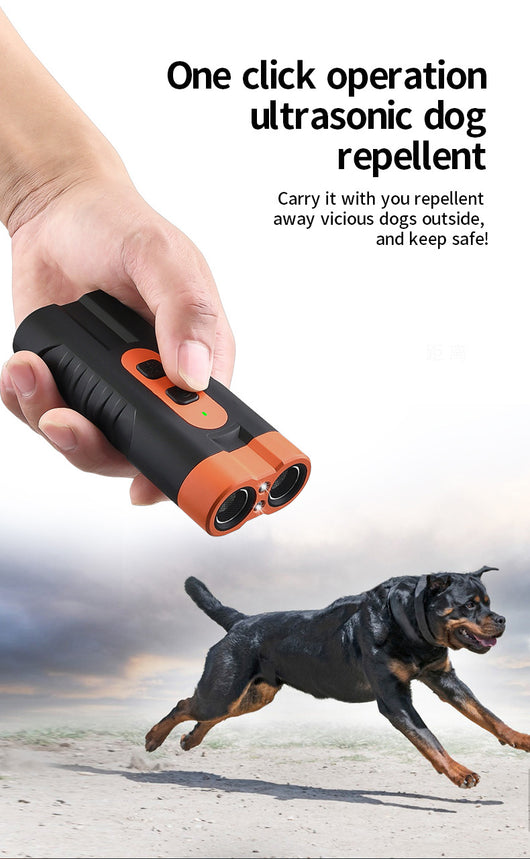 Black and orange handheld ultrasonic dog repellent with two sound emitters and two control buttons. - Image 15