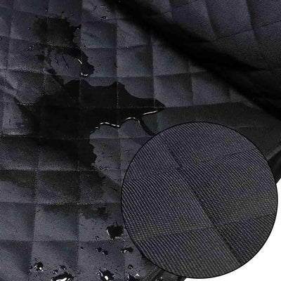 Black quilted pet car seat cover installed on a front passenger seat, protecting the upholstery. - Image 10