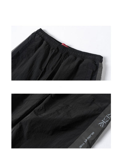 Pantalones Deportivos Reflectantes con Cordón - Diseño Suelto y Moderno - Image 13