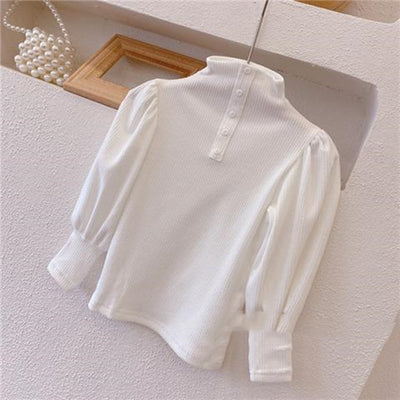 Blusa Infantil con Cuello Alto, Mangas Abullonadas y Botones - Image 13