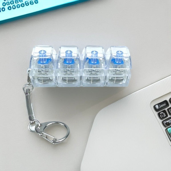 Chaveiro Teclado Mecânico Luminoso de Descompressão com Cristal Transparente