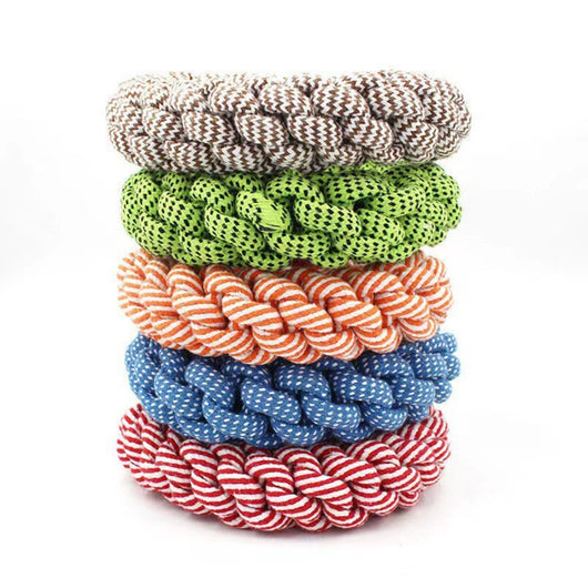 Stack of five durable braided rope dog toys in brown, green, orange, blue, and red, suitable for chewing. - Image 5