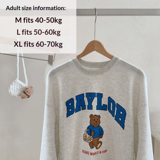 Large dog wearing a teal fleece-lined sweatshirt with 'BAYLOR' text and a bear graphic on the back. - Image 9