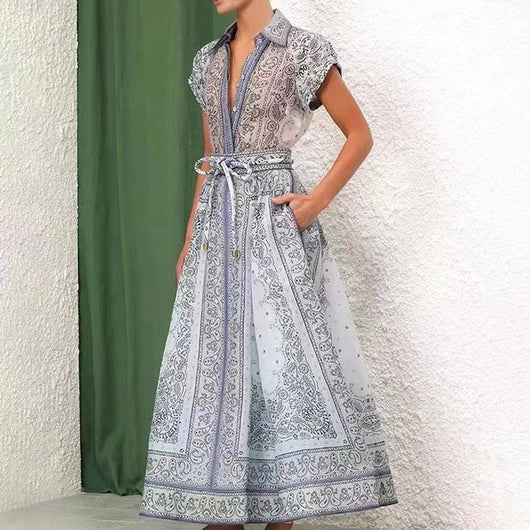 Conjunto Elegante Otoño Invierno: Blusa Estampada de Diseñador + Falda Larga con Cordón