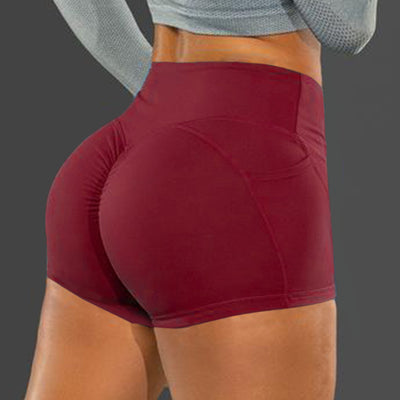 Leggins Deportivos de Color Sólido con Levantamiento en Bolsillos - Image 4