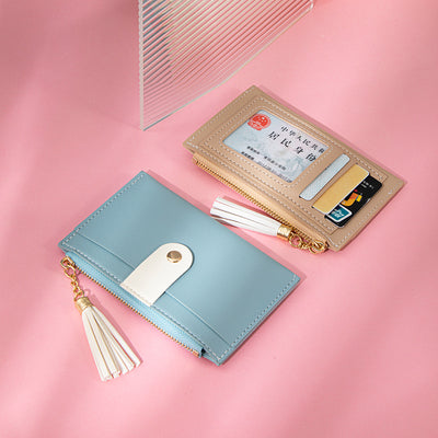 Monedero Compacto de Colores Vibrantes con Borlas y Detalles de Costura - Image 8