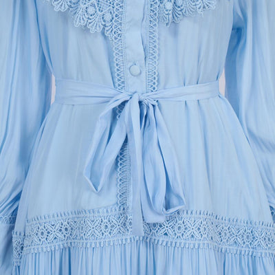 Falda Larga Elegante con Blusa Bordada y Mangas Linterna Ajustadas - Image 16