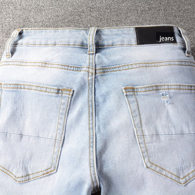 Jeans Azul Claro con Roturas Desgarradas - Image 3