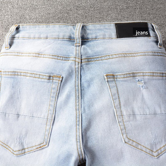 Jeans Azul Claro con Roturas Desgarradas - Image 3