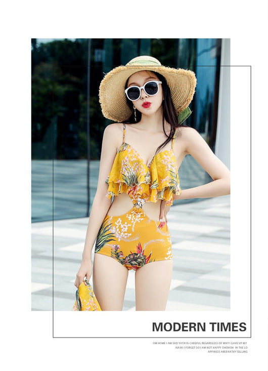 Pink tropical print three-piece women's swimwear set with ruffled bikini top, high-waisted bottoms, and matching sarong. - Image 28