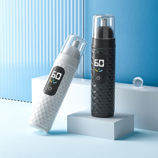 White electric nose hair trimmer with a textured body, clear cap, digital display, and power button.