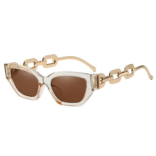 Red cat-eye sunglasses with dark lenses and gold-colored chain link temples on a white background. - Image 7