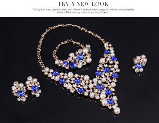 Four-piece bridal jewelry set with gold-toned necklace, earrings, bracelet, and ring, featuring amber and clear rhinestones with faux pearls. - Image 15