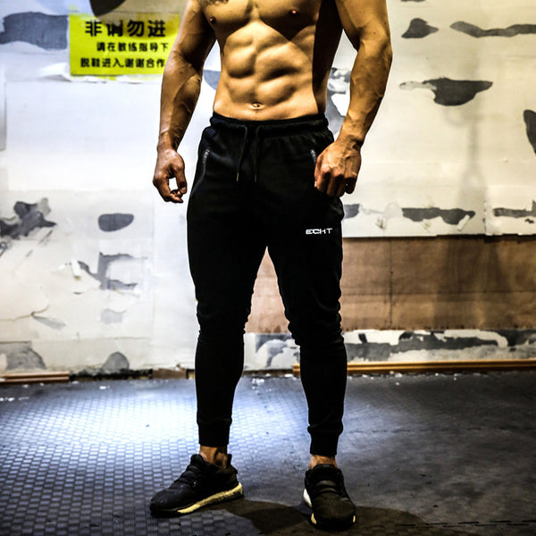 Pantalones deportivos hombre sueltos y secado rápido
