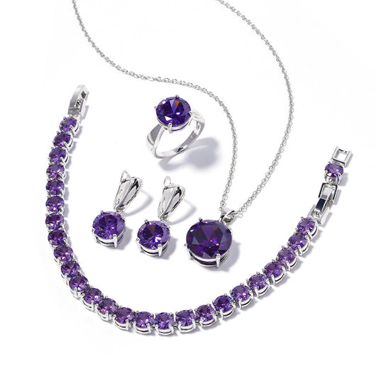 Four-piece jewelry set with silver-toned metal and round deep pink gemstones, including a necklace, bracelet, ring, and earrings. - Image 5